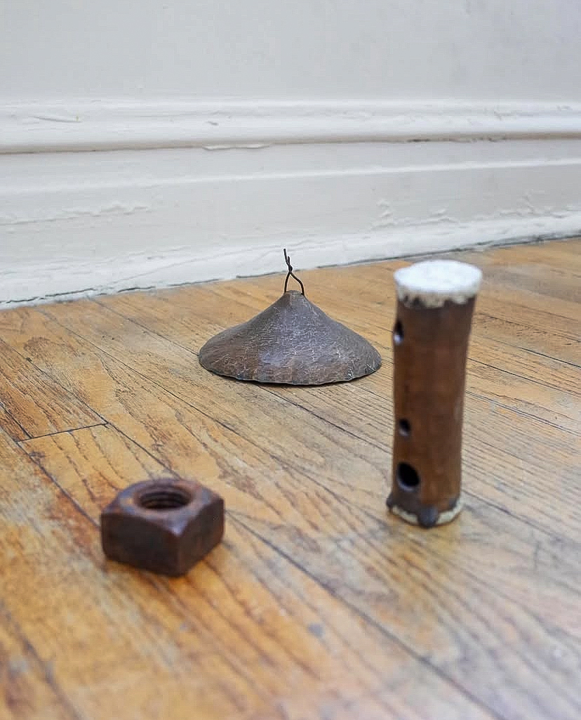 Forged bell, wind maker instrument and found metal object, installation view at Gallery 4009 (detail)